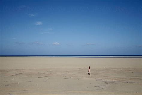 nude women walking on beach